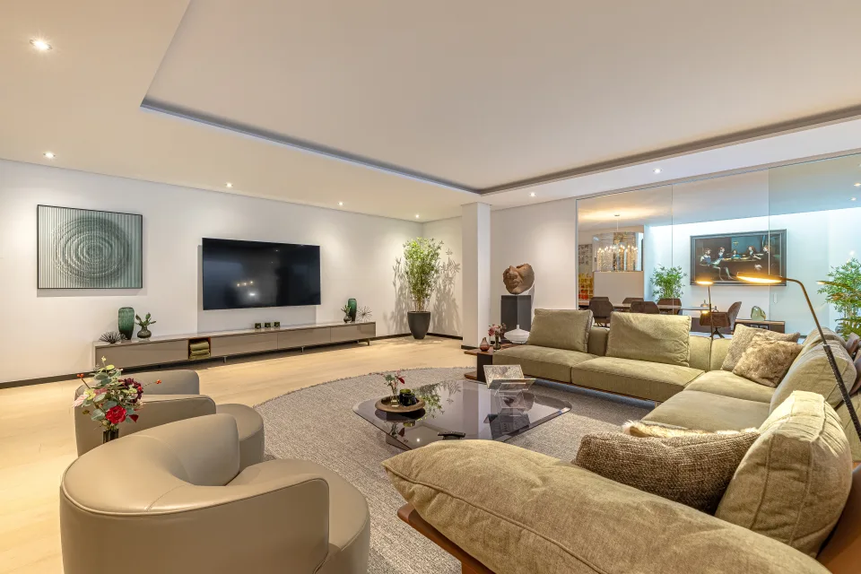 Interior design and architecture photograph of a stylish modern living room with a spacious neutral-tone sofa in Guadalmina Baja